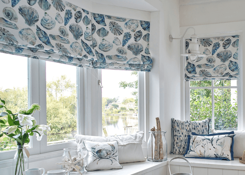 blue floral blinds in white window