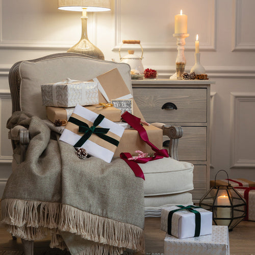 Florence chair pilled high with wrapped gifts